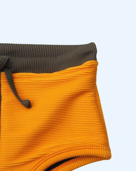 neptune swim trunks | khaki / mango